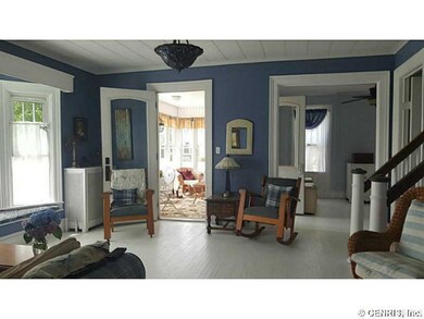 Great Room. Beautiful woodwork and window seat!