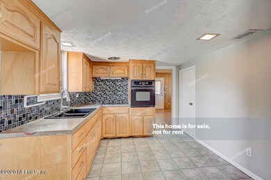 4409 Fender Ct, Jacksonville, FL 32210 - photo 4