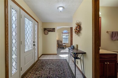 Entryway is spacious and appealing.