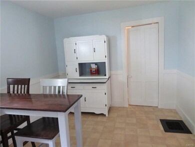 BREAKFAST BAR IN KITCHEN AND ROOM FOR A TABLE IF Y