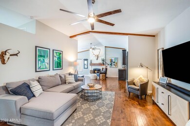 Living Room w/ vaulted ceilings