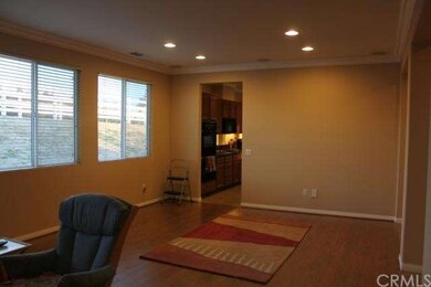 Formal dining area conveniently located to large k