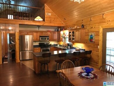 Counter space for extra guest to sit while you coo