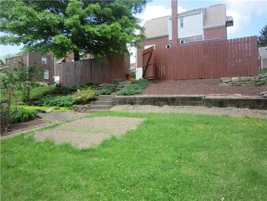 Exterior Front. Beautiful Landscaping surrounds th