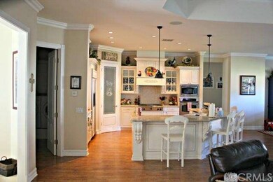 Huge Chefs Kitchen with custom Cabinets.