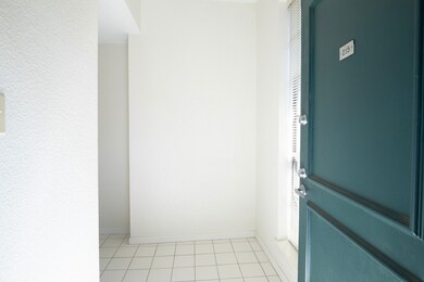 The front door leads into an entry hall perfect fo