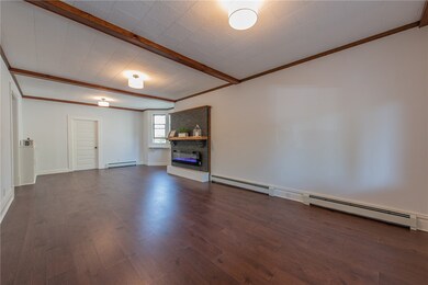 Living room with hardwood flooring throughout