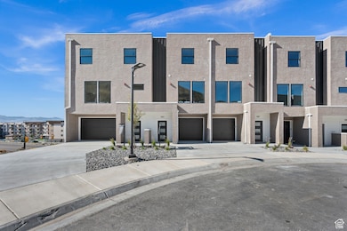 Contemporary house with driveway and an attached garage