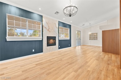 Unfurnished living room featuring a notable chande