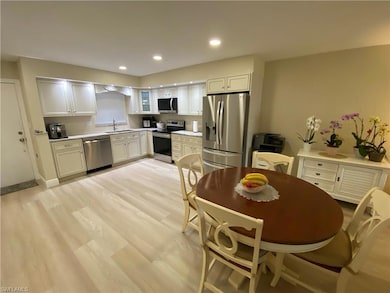Kitchen featuring appliances with stainless steel 