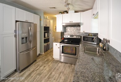 302 Plantation Dr, Titusville, FL 32780 - photo 6