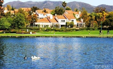 Rancho Santa Margarita Lake not only offers a great place to walk, but also fishing, paddle boating and excercise equipment stops throughout. 