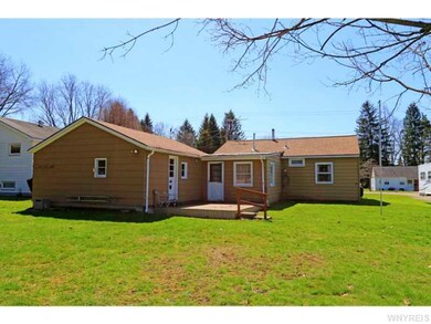 Exterior Back. nice deck on back of this home with