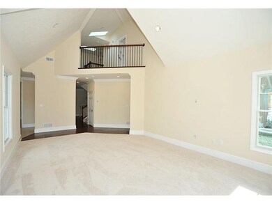 Family Room. Second floor hall overlooks the famil