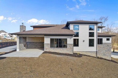 Covered Rear Patio with Fireplace and Built-in Ent