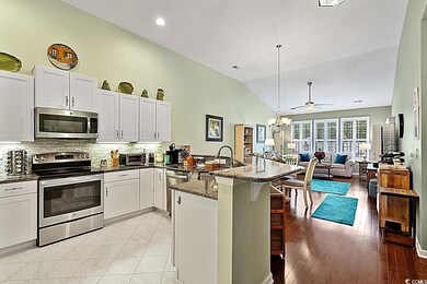 Kitchen with white cabinetry, stainless steel appl