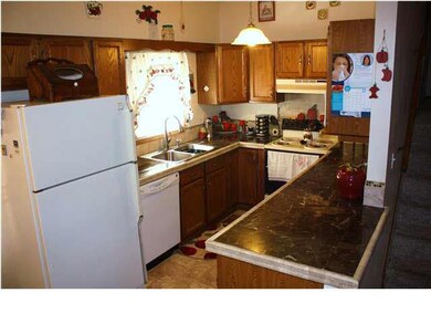 KITCHEN WITH NEW GRANITE COUNTER TOPS AND BACK SPL