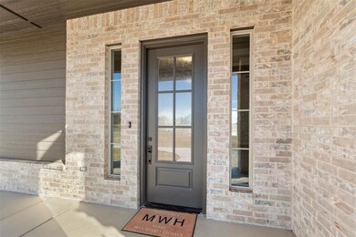 Property entrance with brick siding