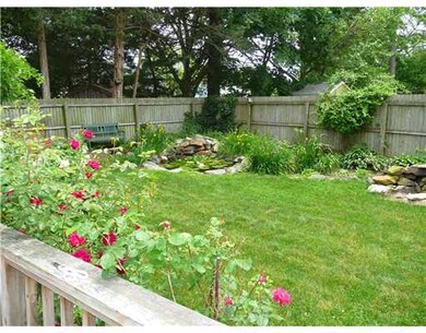 Yard/Garden. View of backyard with water feature.