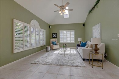 The bright and spacious living room is at one end 