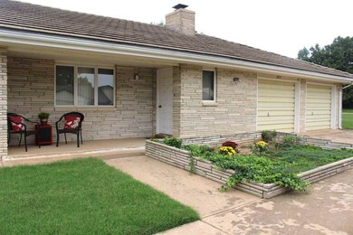 Nice front porch overlooking front landscaping and
