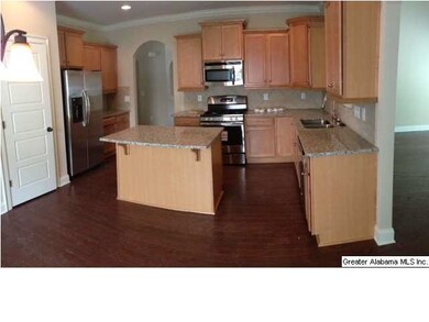 Large kitchen featuring stainless appliances and G