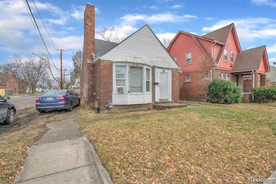 Bungalow-style house featuring a chimney, brick siding, a front yard, and roof with shingles