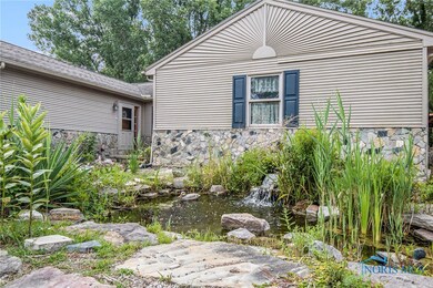 Amazing landscaping. Koi pond and waterfall featur