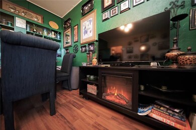 Living-dining room combo with laminate flooring. F