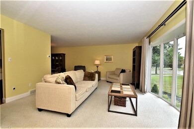 Living room with huge bayed window, floods the roo
