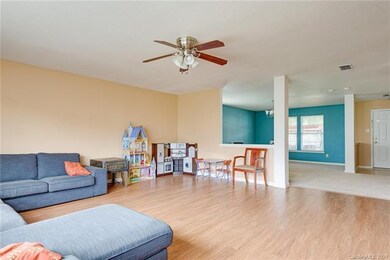 Family room opens up to both the living room/dinin