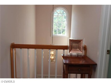 Foyer - Upstairs View of Foyer and Arched Window