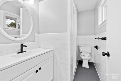 Old meets new. Original tile reworked into clean,