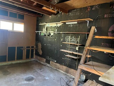 Basement featuring a workshop area