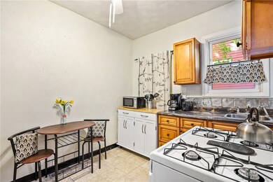 Kitchen is fully functional with room to dine.
