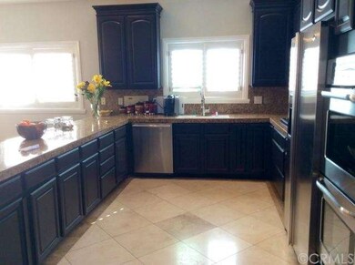 The Travertine Floor, Granite Counters and Stainle