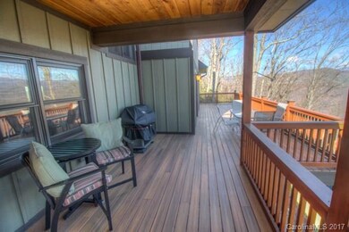 Deck features both open and covered portions. Top 