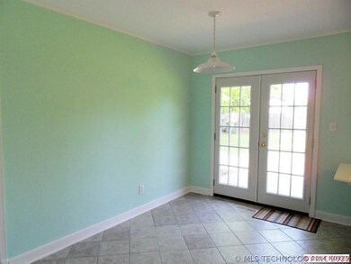 The dining room is open to the kitchen and has gre