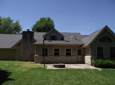 Back yard view of new roof