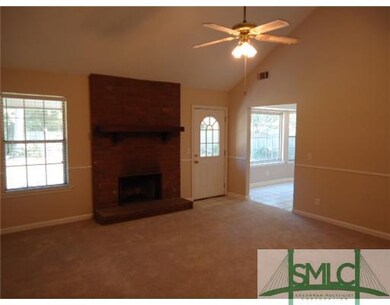 Living Room. Vaulted ceiling in the living room wi