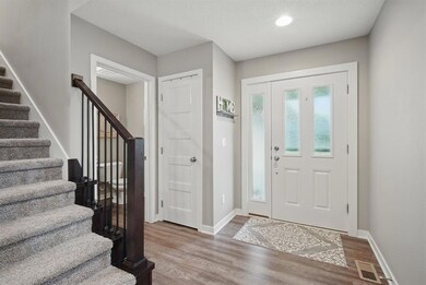 Entry Leading to Main Level Powder Bath