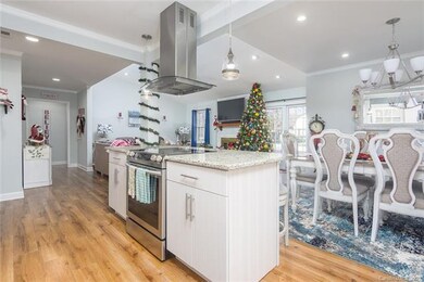 Renovated kitchen with granite countertops and bea