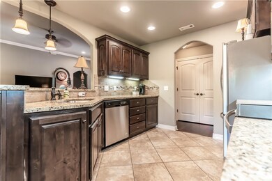 This kitchen is gorgeous with lots of storage and counter space.