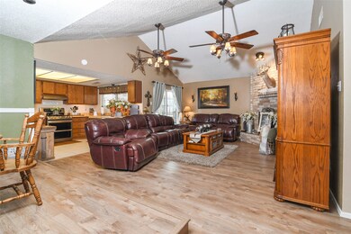 High ceilings in the living room make the room tha