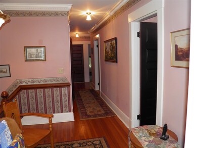 Leads to kitchen via back stairway!