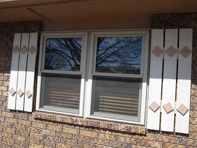 Exterior Front. Unique, new shutters