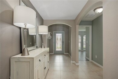 A stunning GLASS FRONT DOOR welcomes you into the 