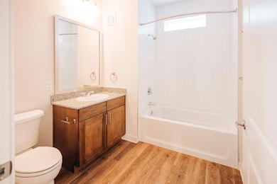 Bathroom with toilet, shower / washtub combinatio