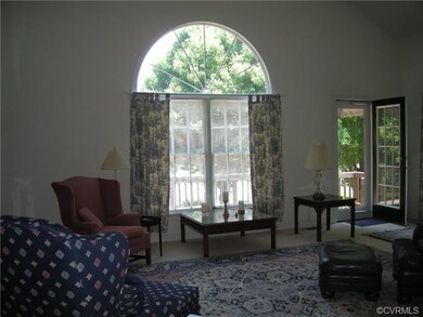 Living area has vaulted ceiling, gas brick fp and 
