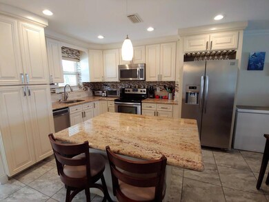 Custom Wood Cabinetry/Granite